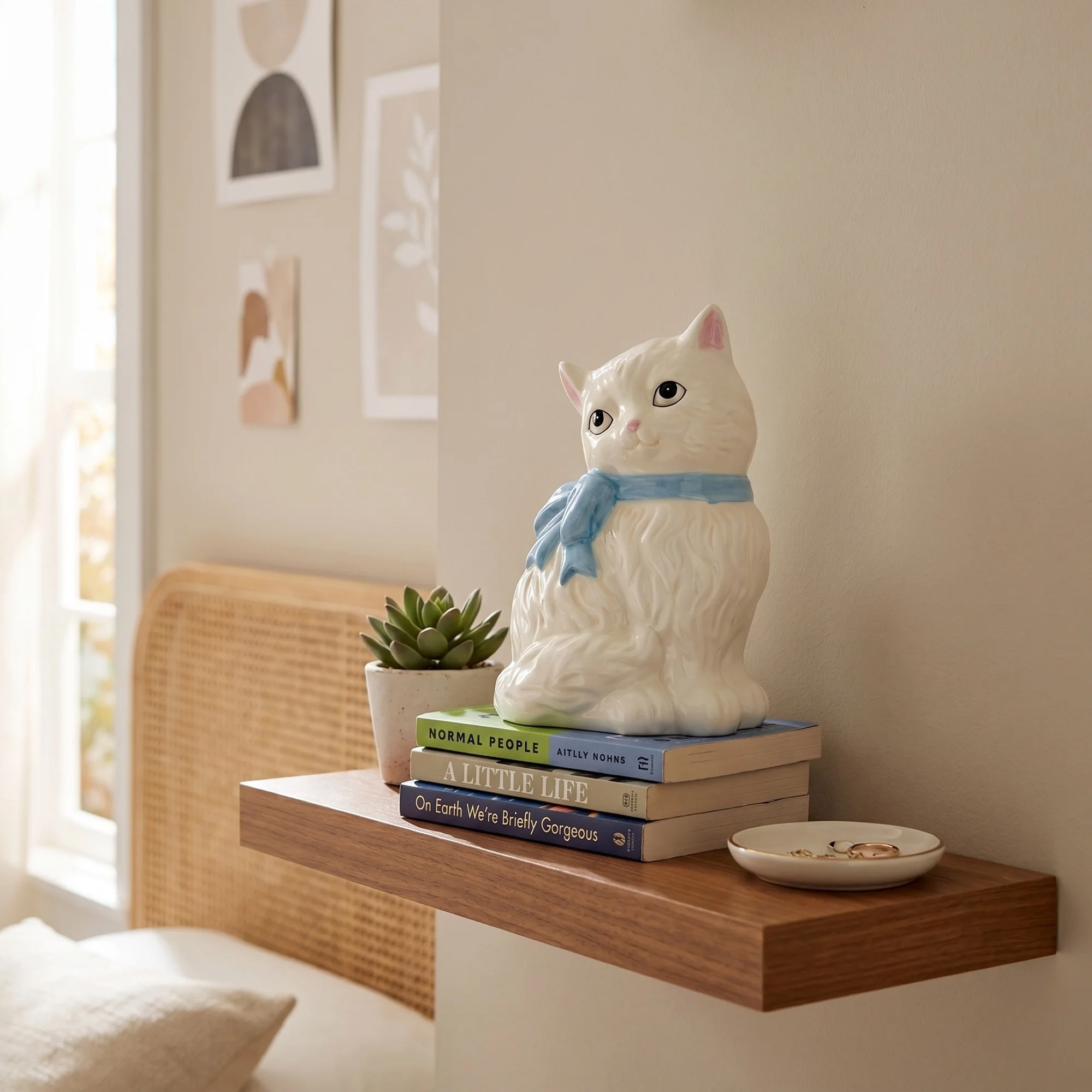 A Porcelain Cat With a Bow, for the Shelf That Needs a Familiar
