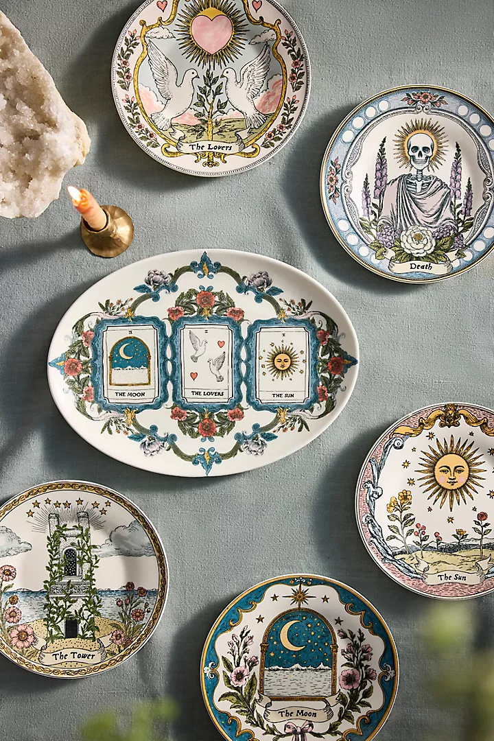A stoneware dinner plate illustrated with The Lovers tarot card, doves, and a floral border