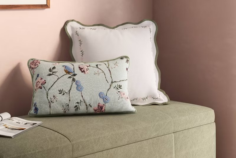 A Botanical Lumbar Pillow With Just Enough Bird-and-Branch Detail